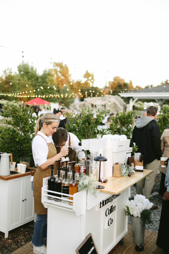Homegrown baristas serving coffee at an outdoor gathering